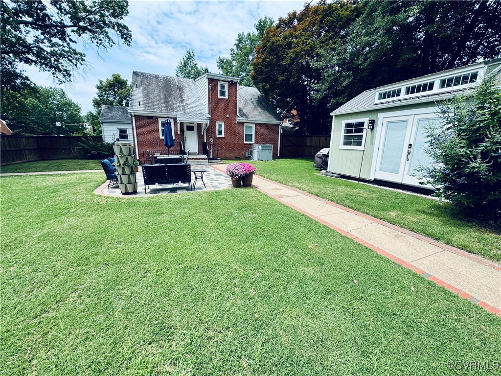 4100 Patterson Avenue Richmond, VA 23221 - Photo 33 of 37 a view of a house with a yard and sitting area