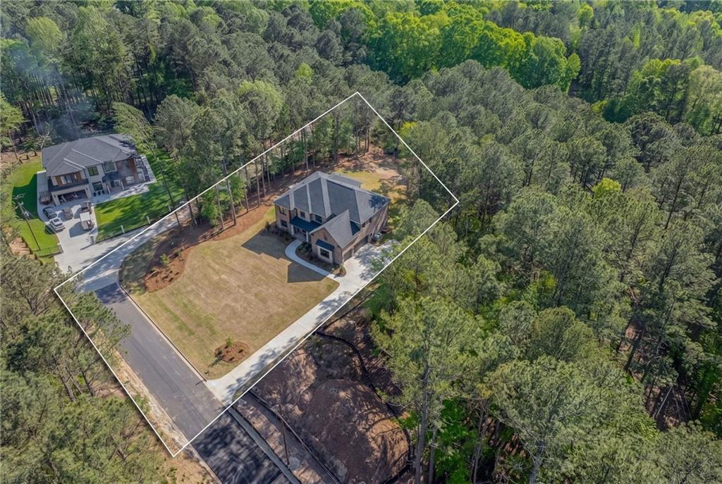1559 Whitley Road Dacula, GA 30019 - Photo 21 of 34 an aerial view of a house with a yard