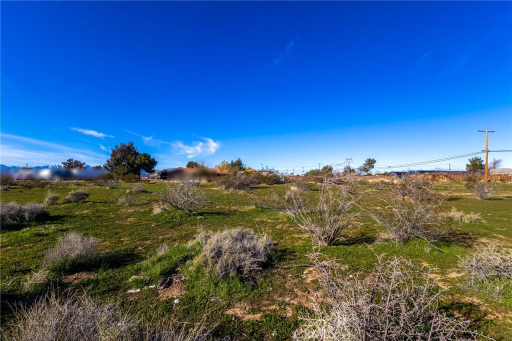 1 Cholame Road Victorville, CA 92392 - Photo 9 of 11 a view of a building in a field