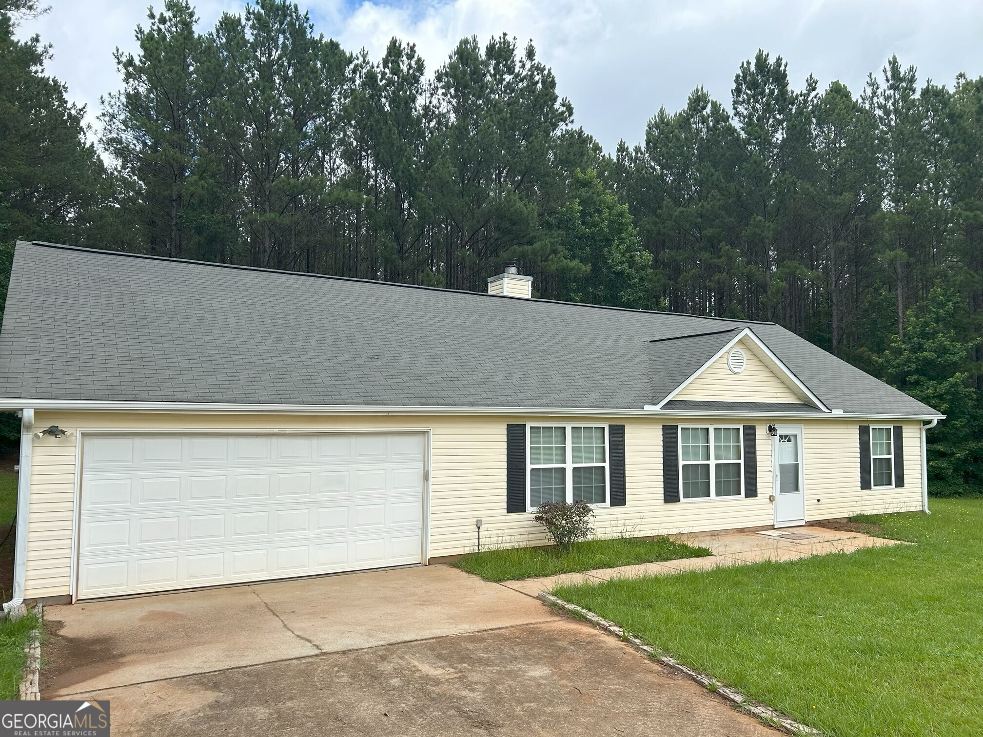 134 Cemetary Road Luthersville, GA 30251 - Photo 3 of 18 a front view of a house with a yard