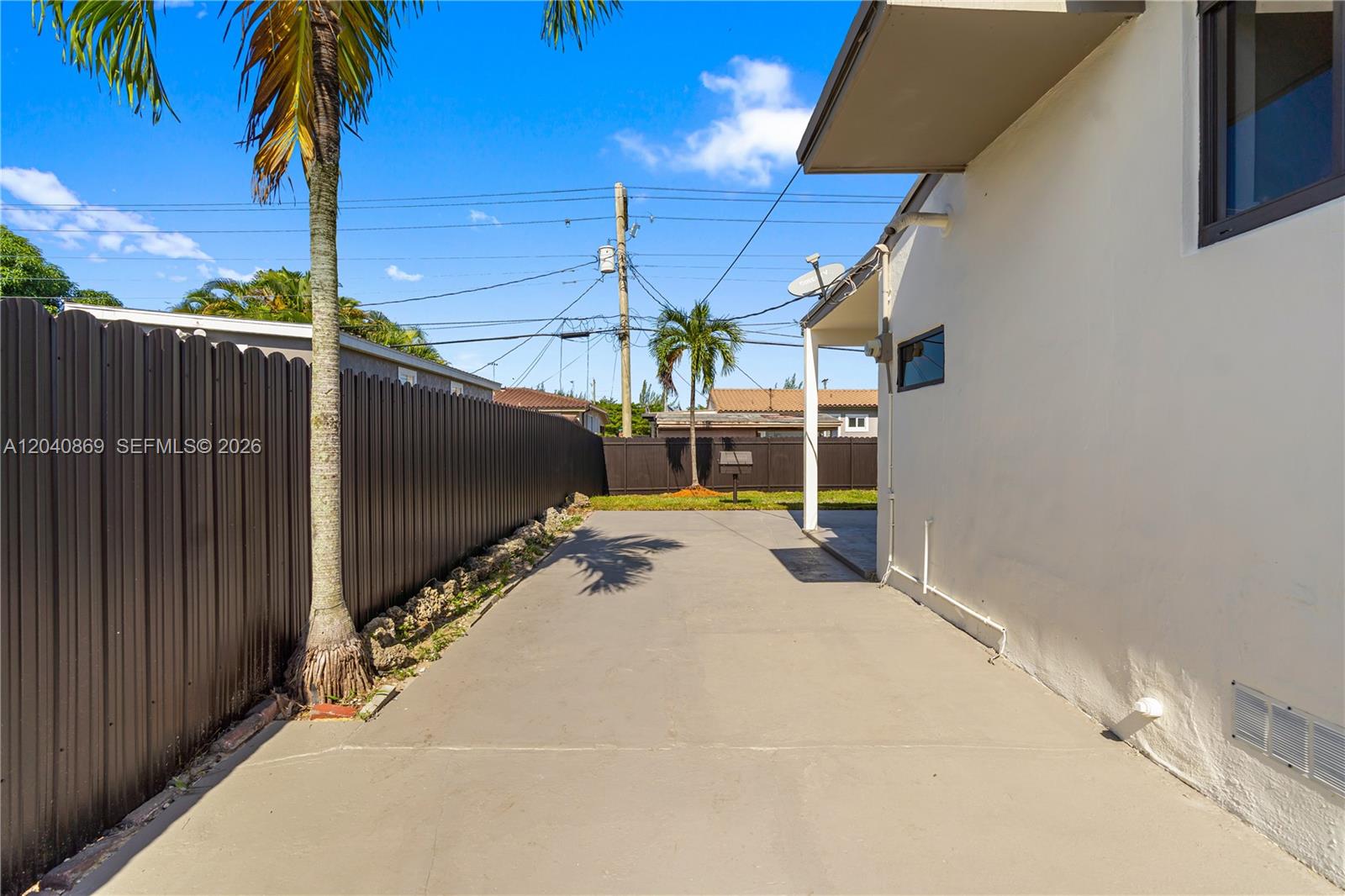 31 West 64th Street Hialeah, FL 33012 - Photo 43 of 49 a view of a house with a backyard