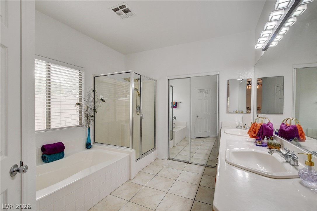1020 East Rome Boulevard North Las Vegas, NV 89086 - Photo 15 of 29 Primary Bath w/Walk-In Closet, Separate Shower & Tub