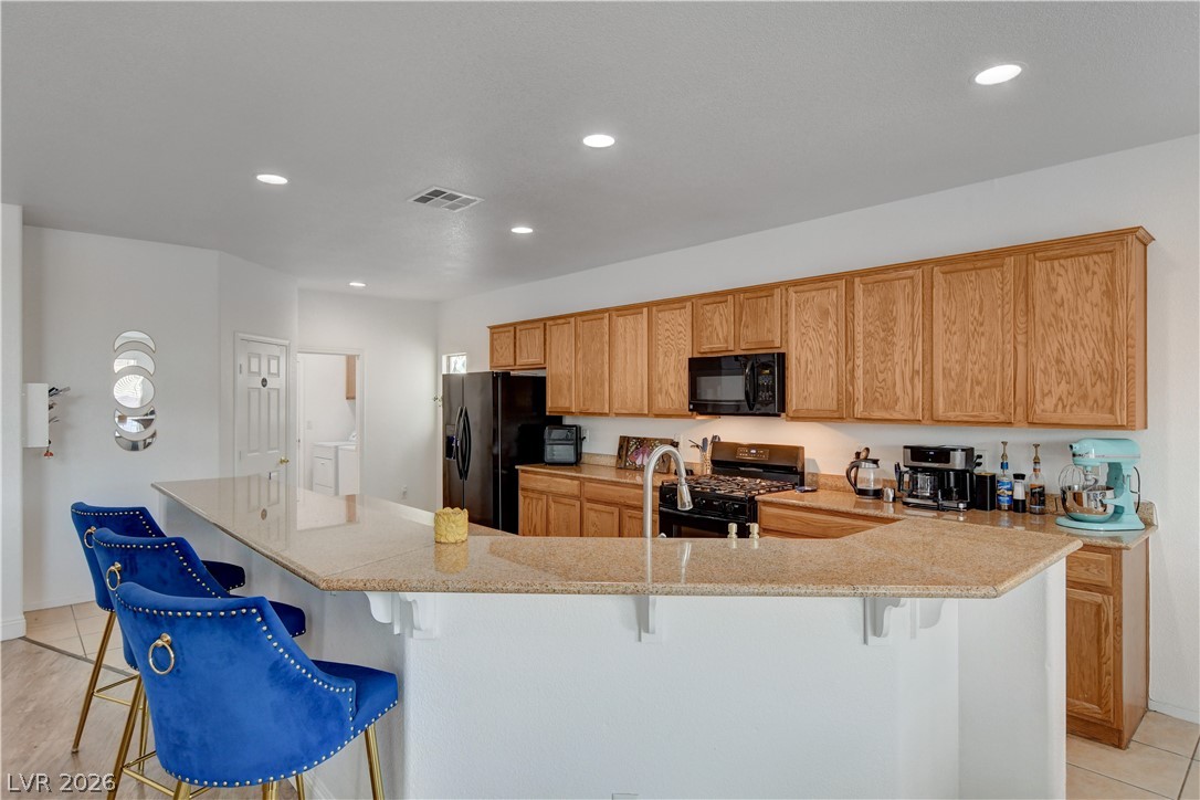1020 East Rome Boulevard North Las Vegas, NV 89086 - Photo 7 of 29 Kitchen w/Large Breakfast Bar