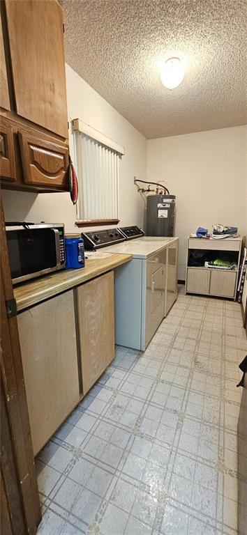 10881 Southwest 79th Terrace Ocala, FL 34476 - Photo 11 of 38 a kitchen with stainless steel appliances a sink and cabinets