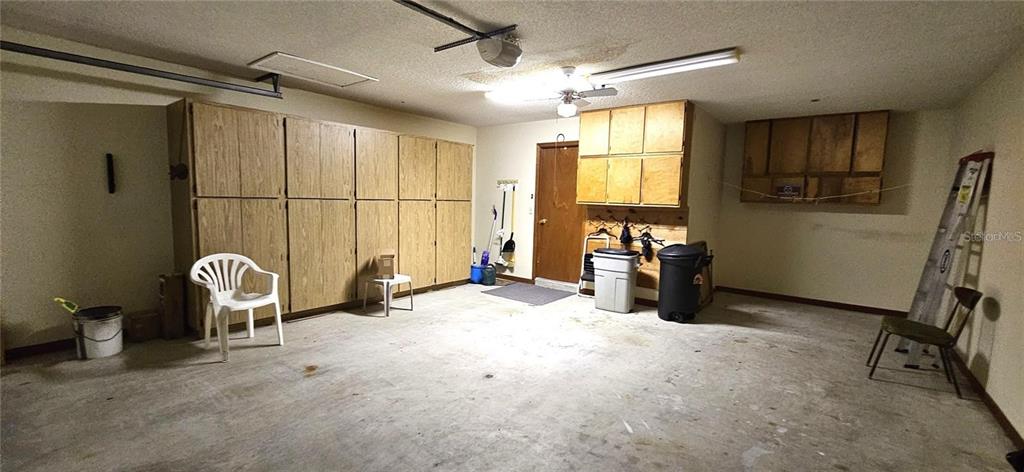 10881 Southwest 79th Terrace Ocala, FL 34476 - Photo 23 of 38 a view of a room with gym equipment