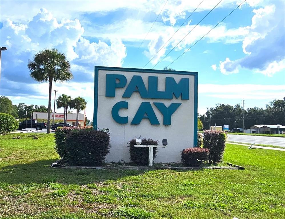 10881 Southwest 79th Terrace Ocala, FL 34476 - Photo 25 of 38 a view of a chair and table in the garden