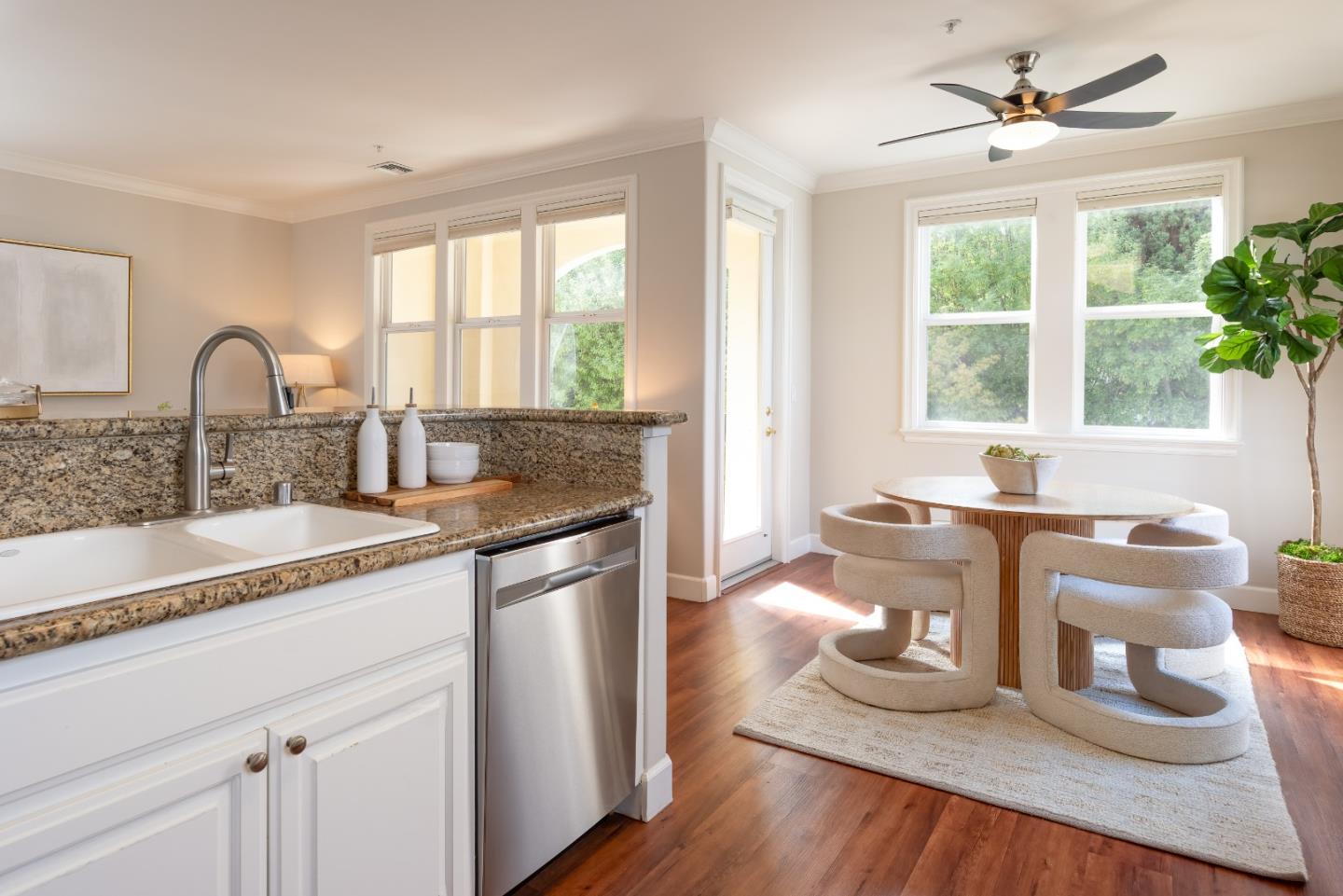 1237 Capuchino Avenue, Unit 7 Burlingame, CA 94010 - Photo 14 of 40 a kitchen with granite countertop a sink and a stove