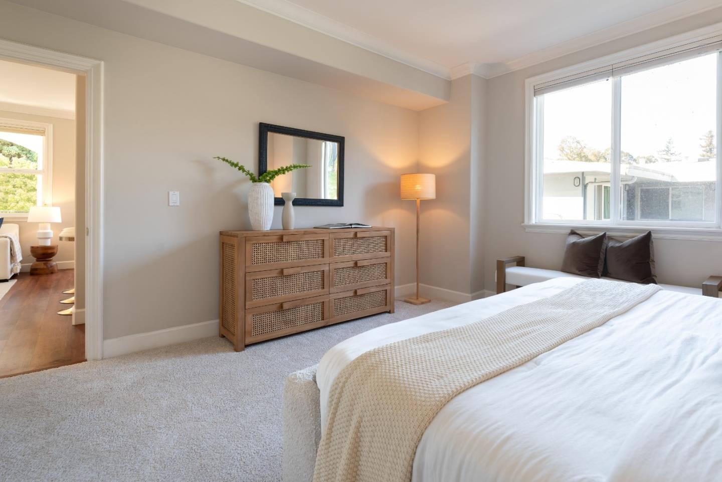 1237 Capuchino Avenue, Unit 7 Burlingame, CA 94010 - Photo 18 of 40 a bedroom with a bed and a dresser