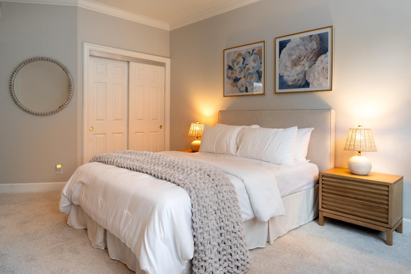 1237 Capuchino Avenue, Unit 7 Burlingame, CA 94010 - Photo 26 of 40 a bedroom with a bed and a painting on the wall