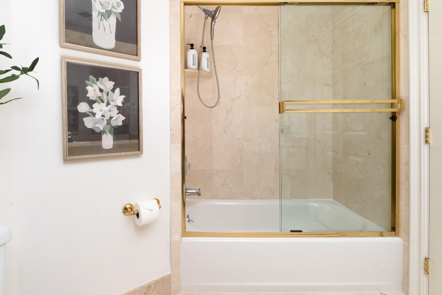 1237 Capuchino Avenue, Unit 7 Burlingame, CA 94010 - Photo 28 of 40 a bath tub sitting next to a shower