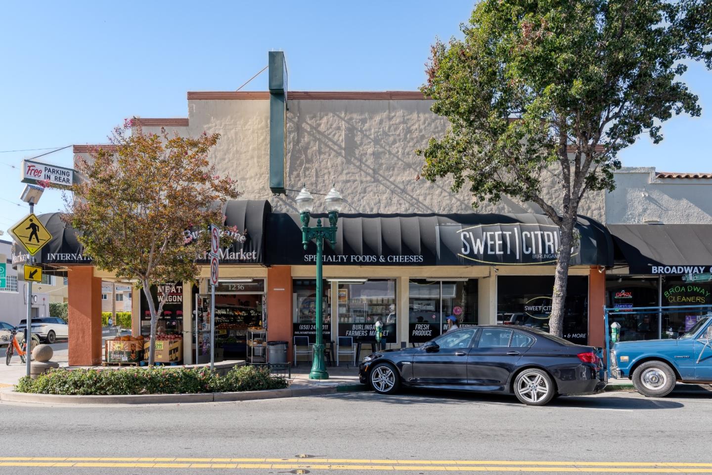 1237 Capuchino Avenue, Unit 7 Burlingame, CA 94010 - Photo 35 of 40 a car parked in front of a building