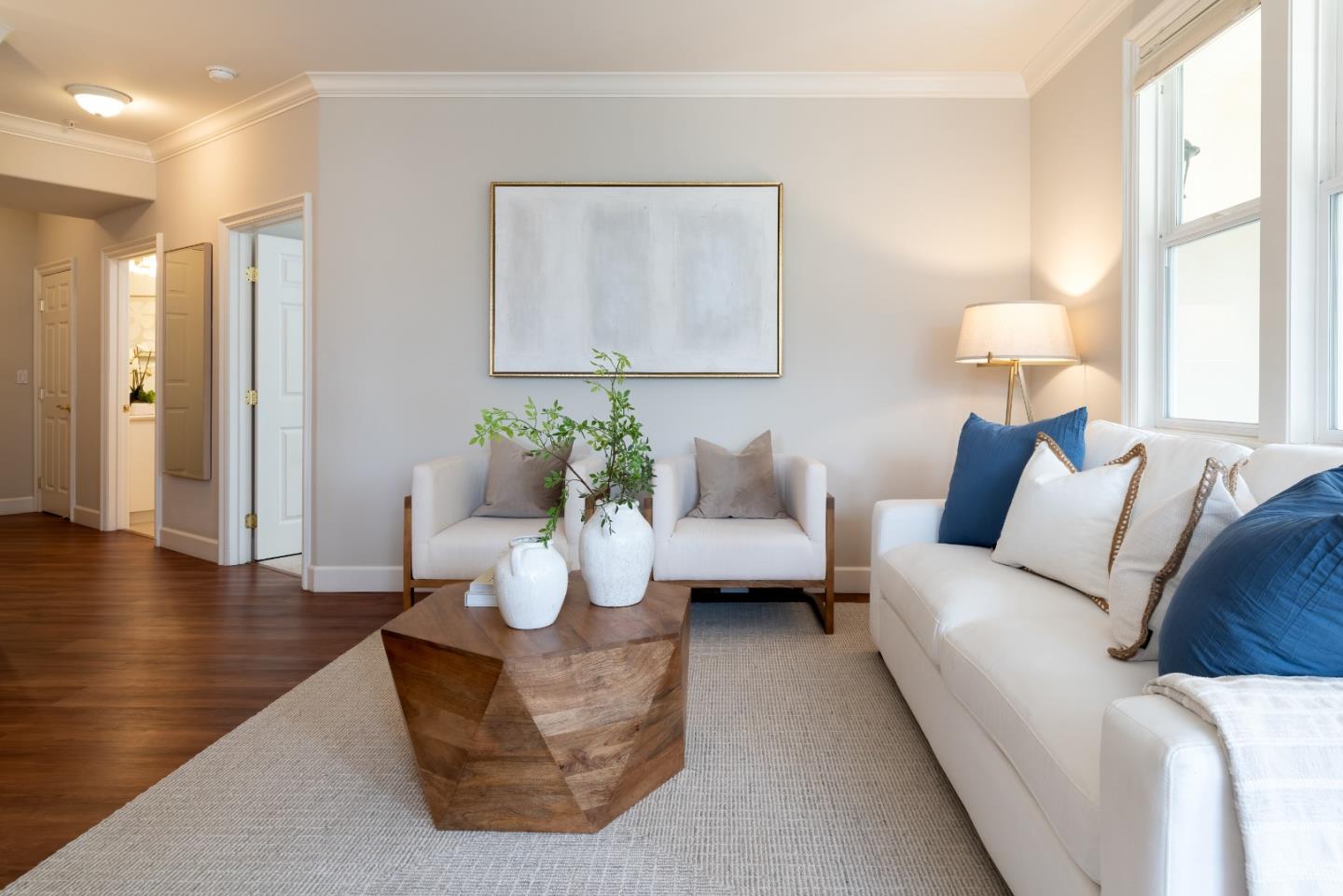 1237 Capuchino Avenue, Unit 7 Burlingame, CA 94010 - Photo 4 of 40 a living room with furniture and a large window
