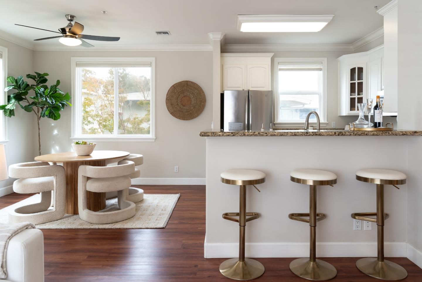1237 Capuchino Avenue, Unit 7 Burlingame, CA 94010 - Photo 6 of 40 a view of a kitchen with chair and a potted plant