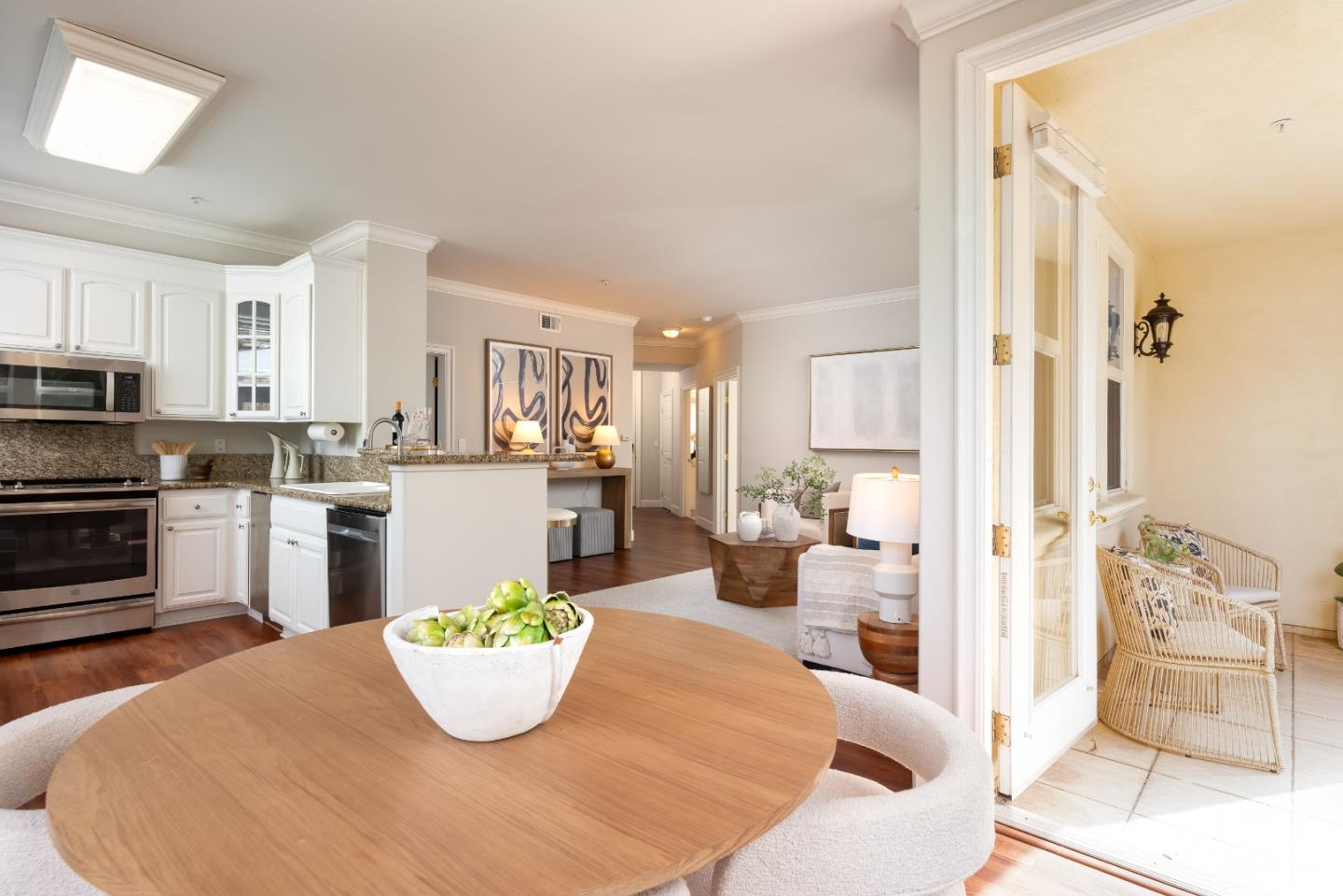 1237 Capuchino Avenue, Unit 7 Burlingame, CA 94010 - Photo 9 of 40 a kitchen with a refrigerator and a stove top oven