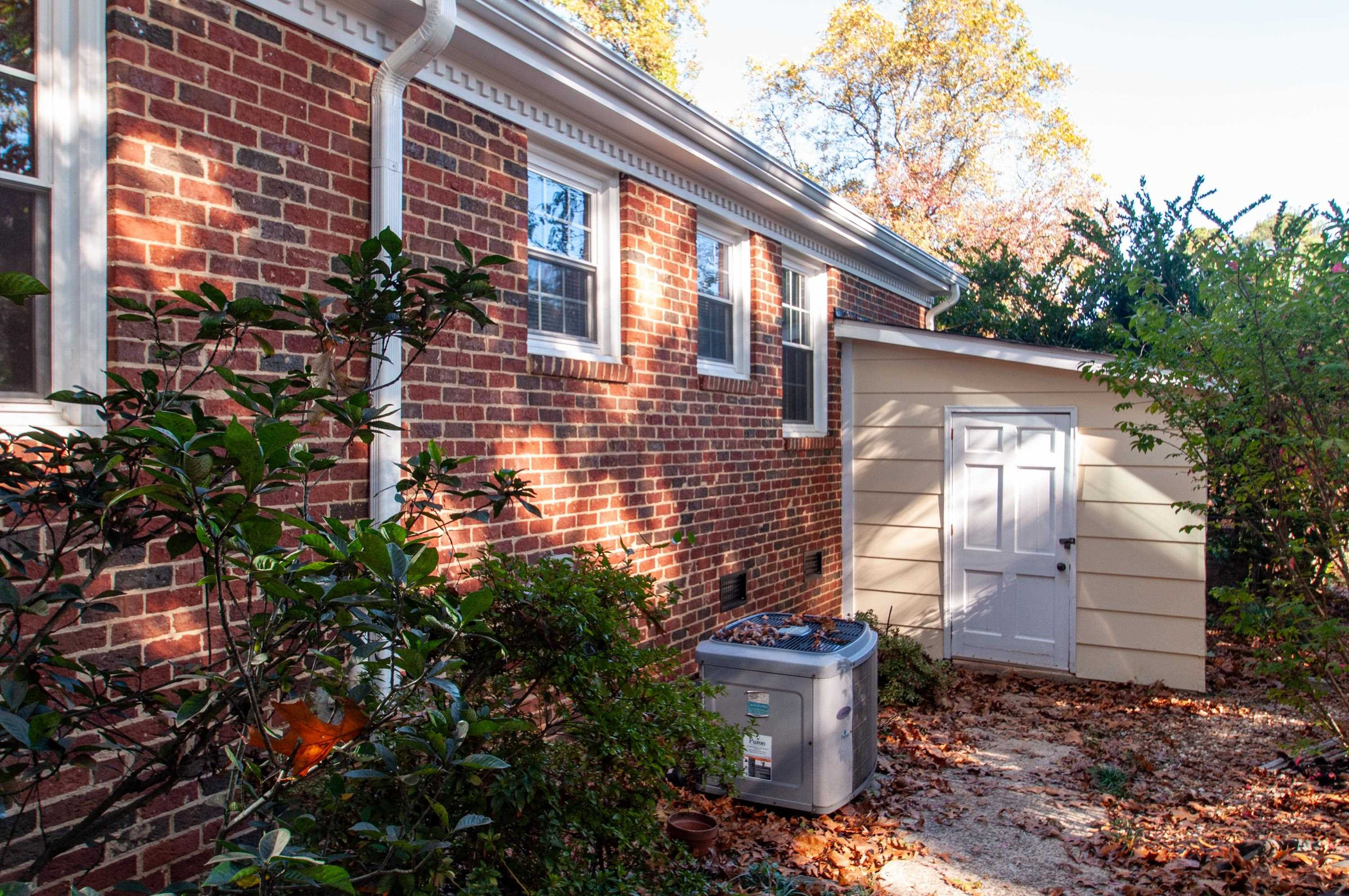2104 Myron Drive Raleigh, NC 27607 - Photo 33 of 35 a view of a house with a yard
