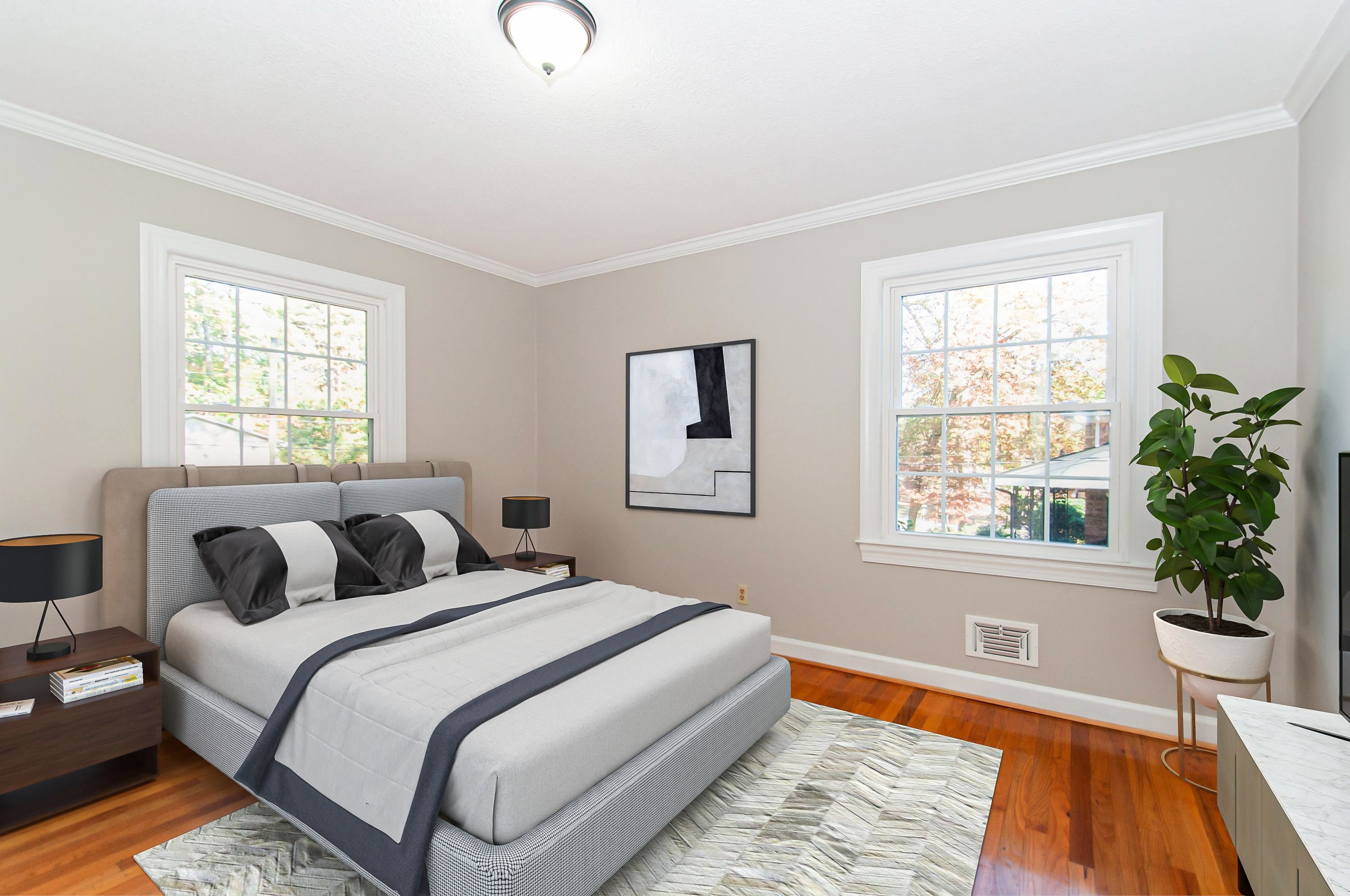 2104 Myron Drive Raleigh, NC 27607 - Photo 8 of 35 a bedroom with bed and window