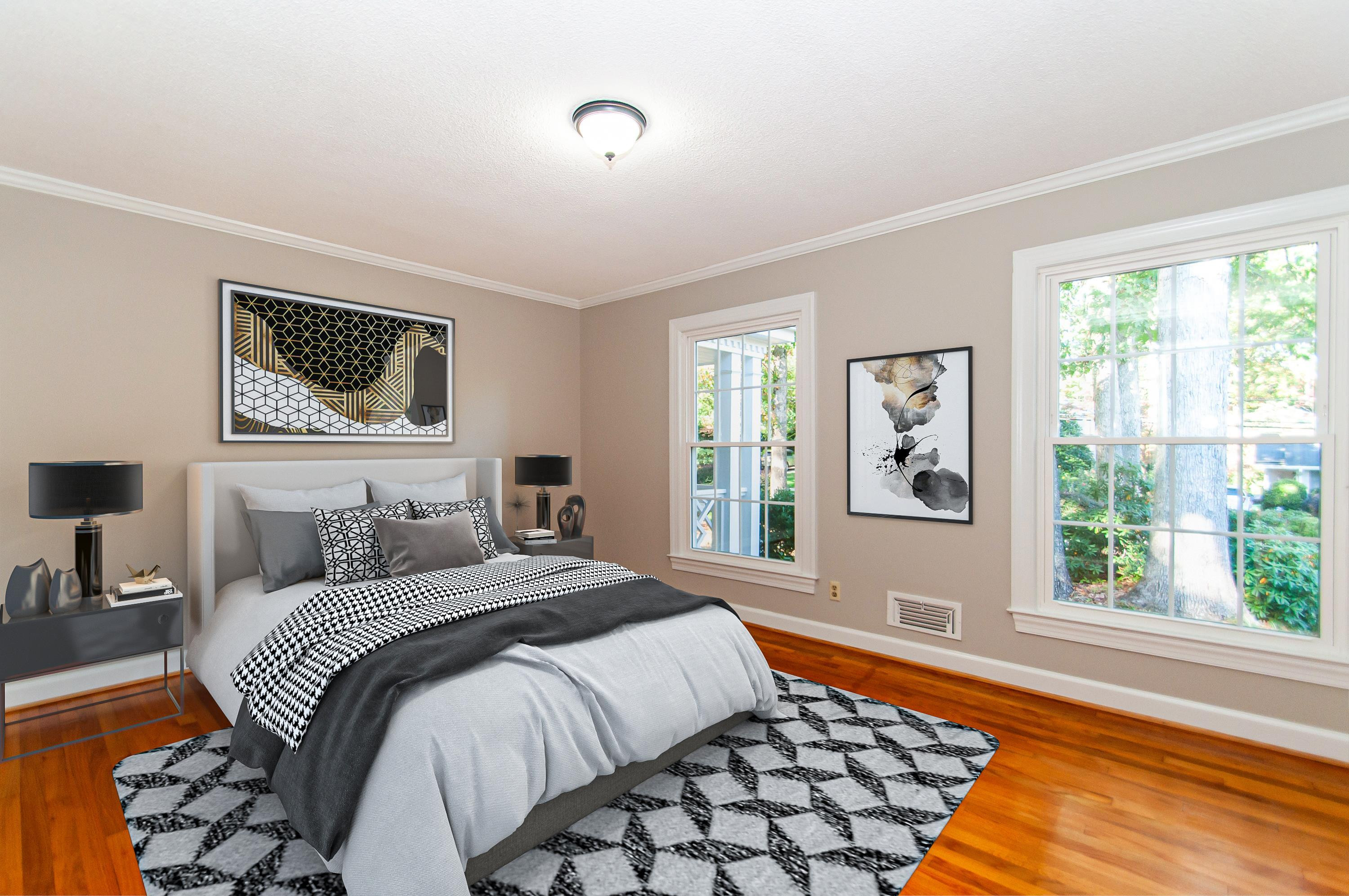 2104 Myron Drive Raleigh, NC 27607 - Photo 9 of 35 a bedroom with a bed and a window
