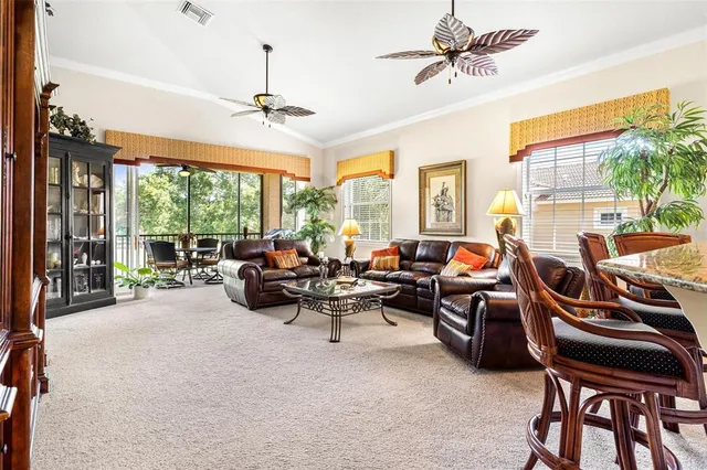 a kitchen with a sink cabinets and window