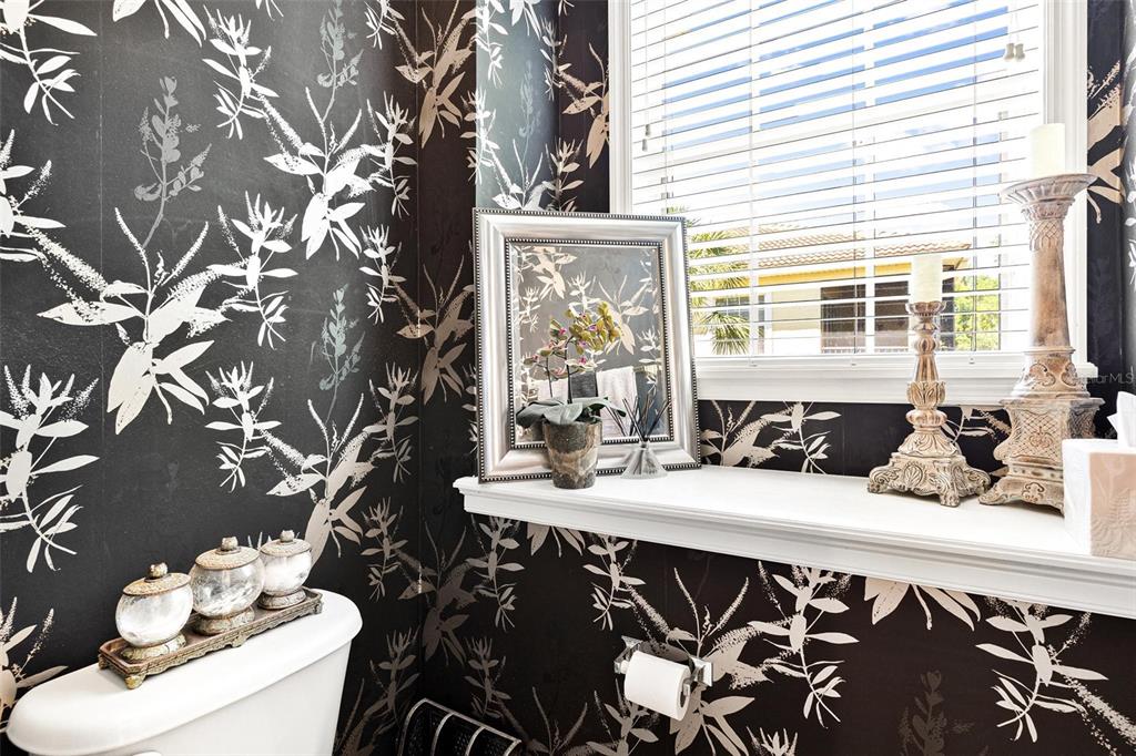 26142 Avenida Las Colinas, Unit 2B Howey-in-the-Hills, FL 34737 - Photo 45 of 78 a view of a dining room with furniture window and outside view