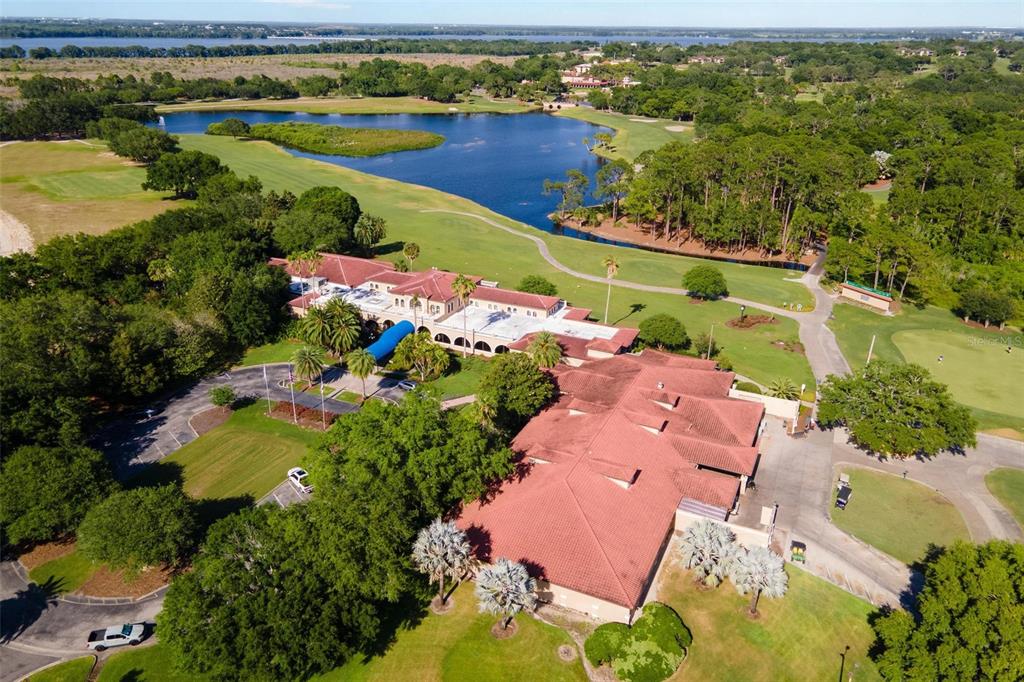 26142 Avenida Las Colinas, Unit 2B Howey-in-the-Hills, FL 34737 - Photo 66 of 78 an aerial view of a houses with outdoor space swimming pool
