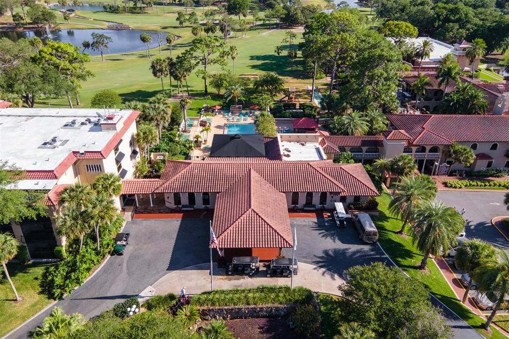 26142 Avenida Las Colinas, Unit 2B Howey-in-the-Hills, FL 34737 - Photo 73 of 78 an aerial view of house with swimming pool outdoor seating and yard