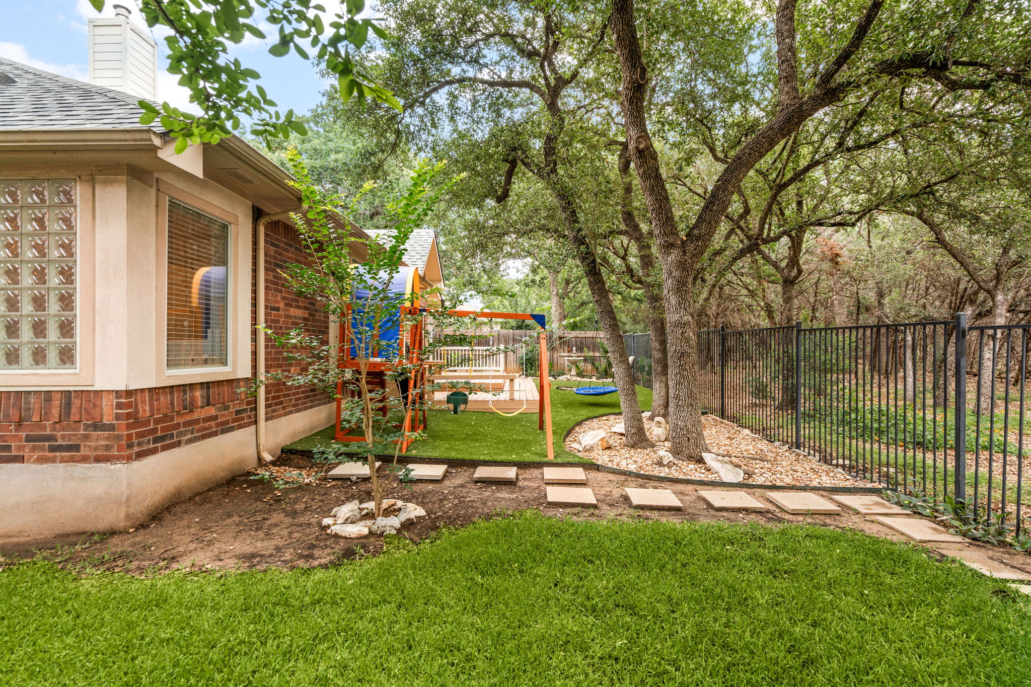 1718 Nelson Ranch Loop Cedar Park, TX 78613 - Photo 31 of 33 a view of backyard of house with outdoor seating and green space