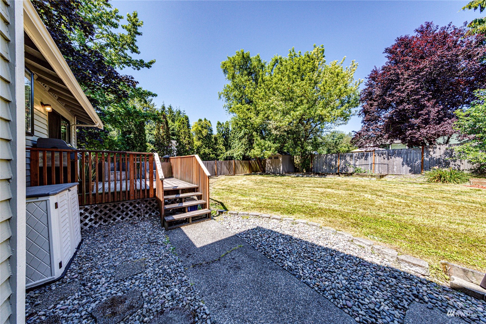 1027 233rd Place Southwest Bothell, WA 98021 - Photo 20 of 27 a view of swimming pool with a yard