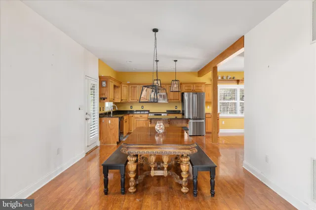 a view of dining room with wooden floor