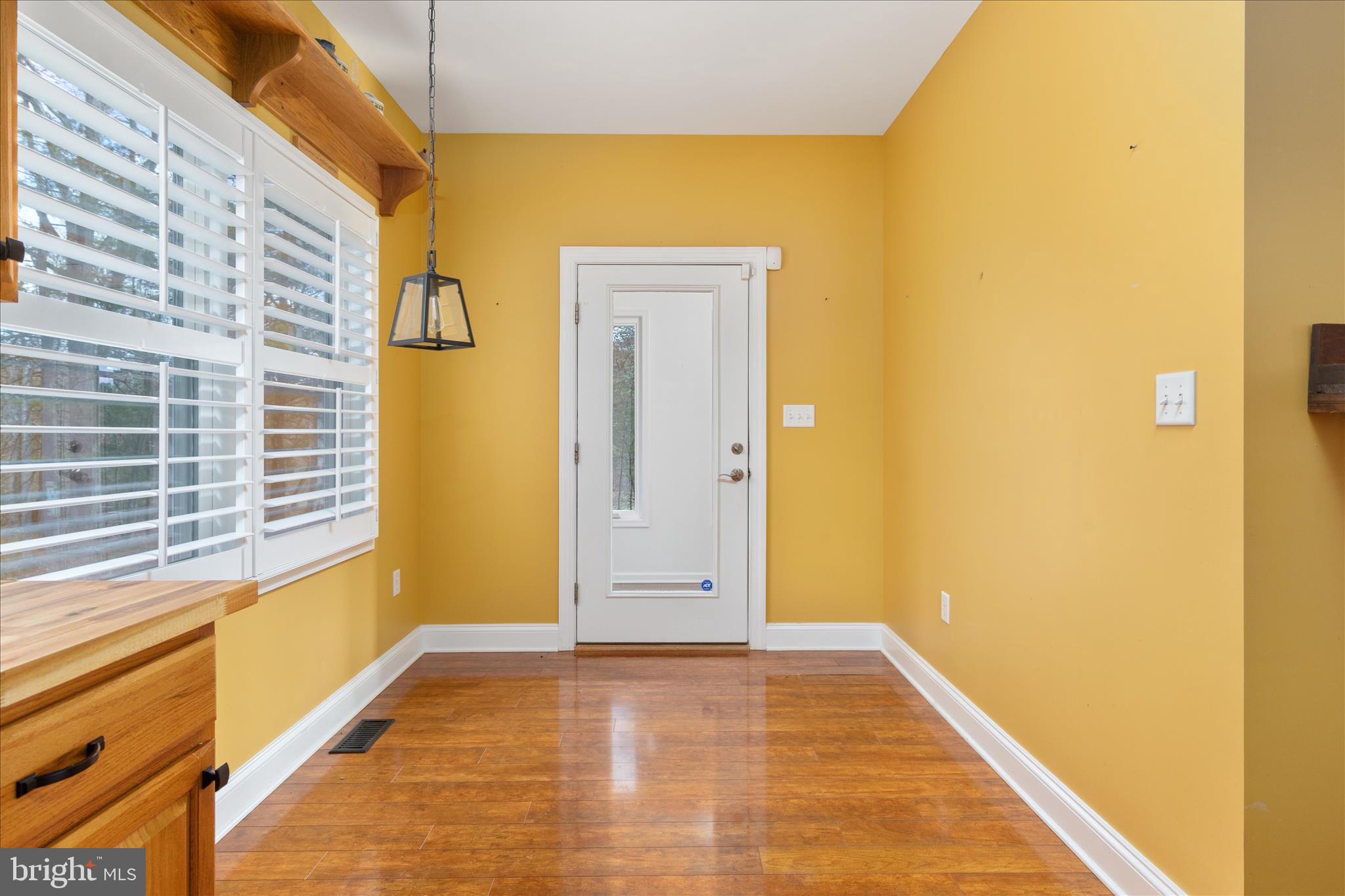 882 Liberty Furnace Road Edinburg, VA 22824 - Photo 15 of 47 a view of an empty room with a window