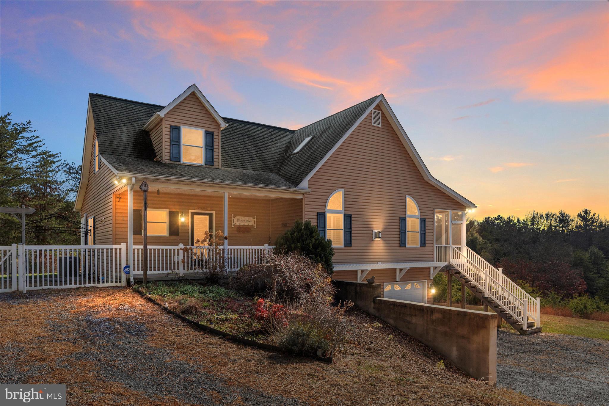 882 Liberty Furnace Road Edinburg, VA 22824 - Photo 3 of 47 a front view of a house with a yard