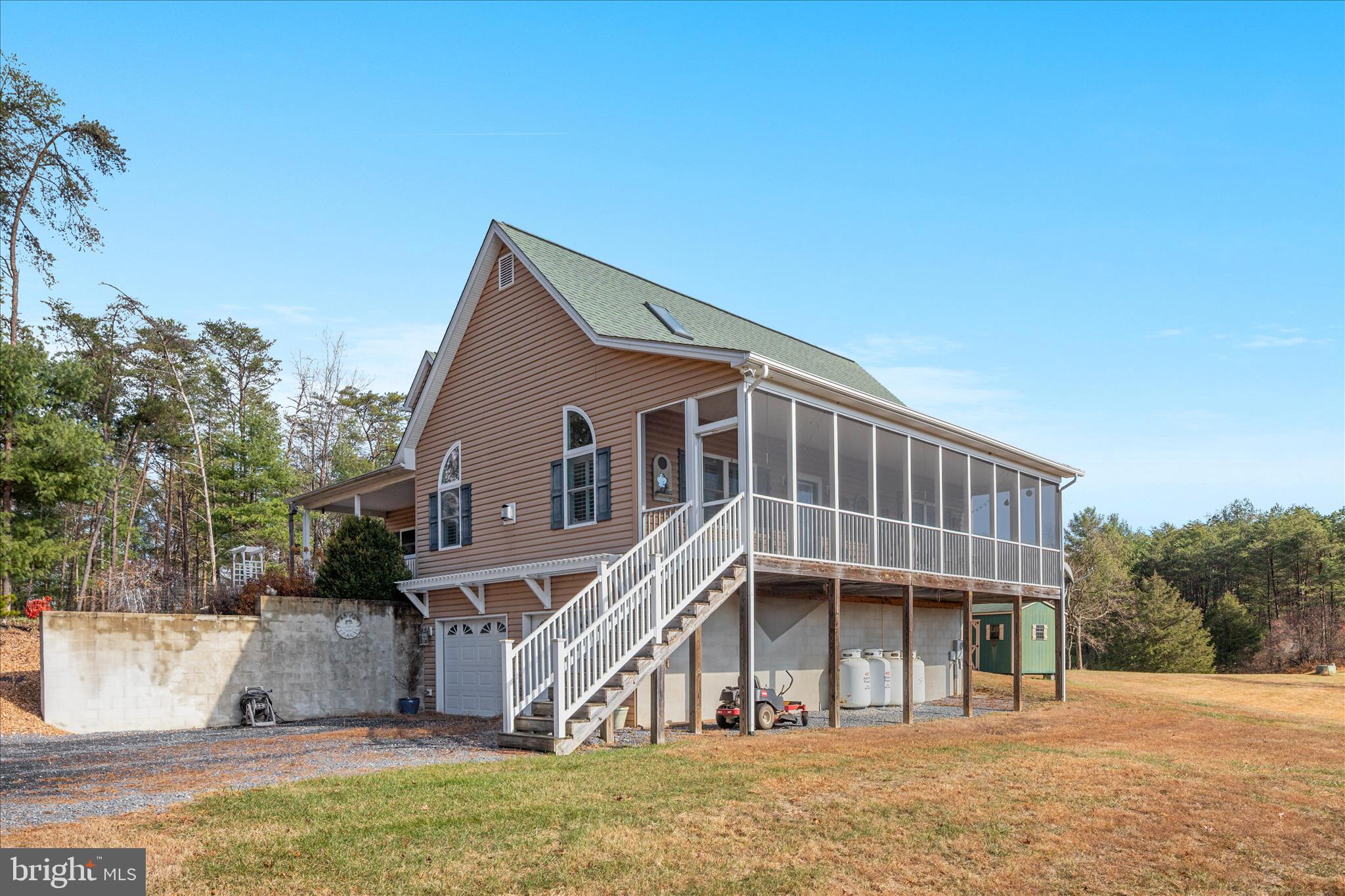 882 Liberty Furnace Road Edinburg, VA 22824 - Photo 40 of 47 a front view of a house with a yard