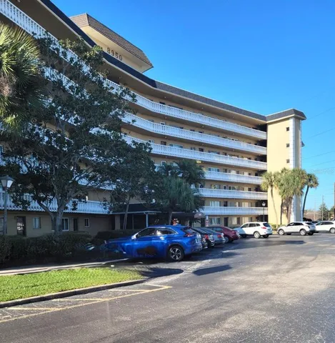 a view of street with parked cars