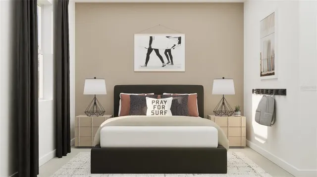 a bedroom with a bed and a painting on the wall