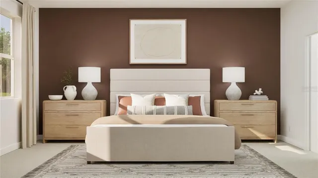 a living room with furniture and white wall painting