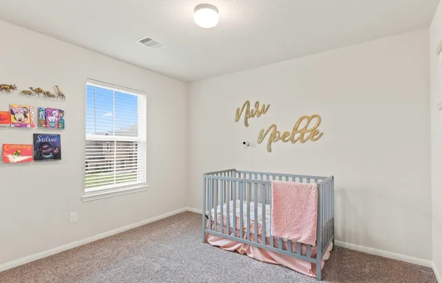 a view of a hallway with windows