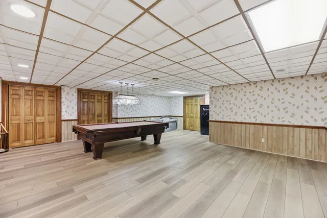 a room with furniture and wooden floor