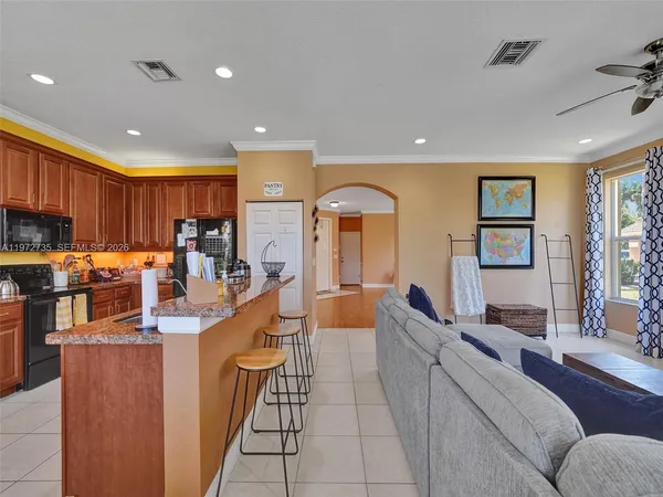 a view of a dining room with furniture window and outside view