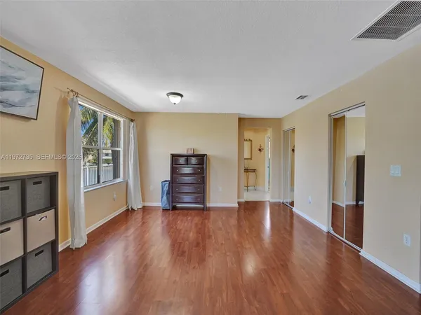 a view of a room with racks on the wall