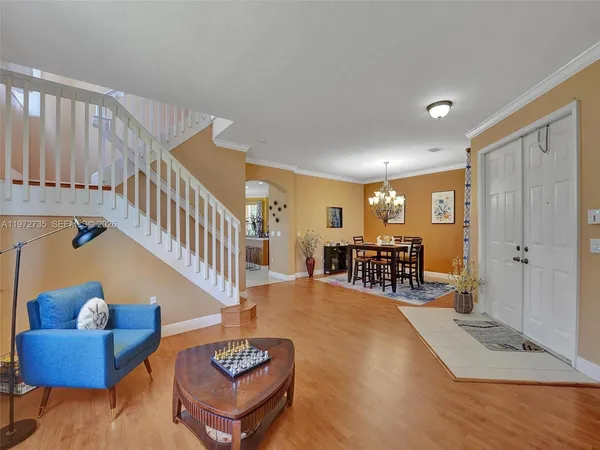 a living room with furniture and a gate