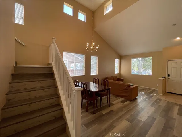 a view of a hallway with stairs