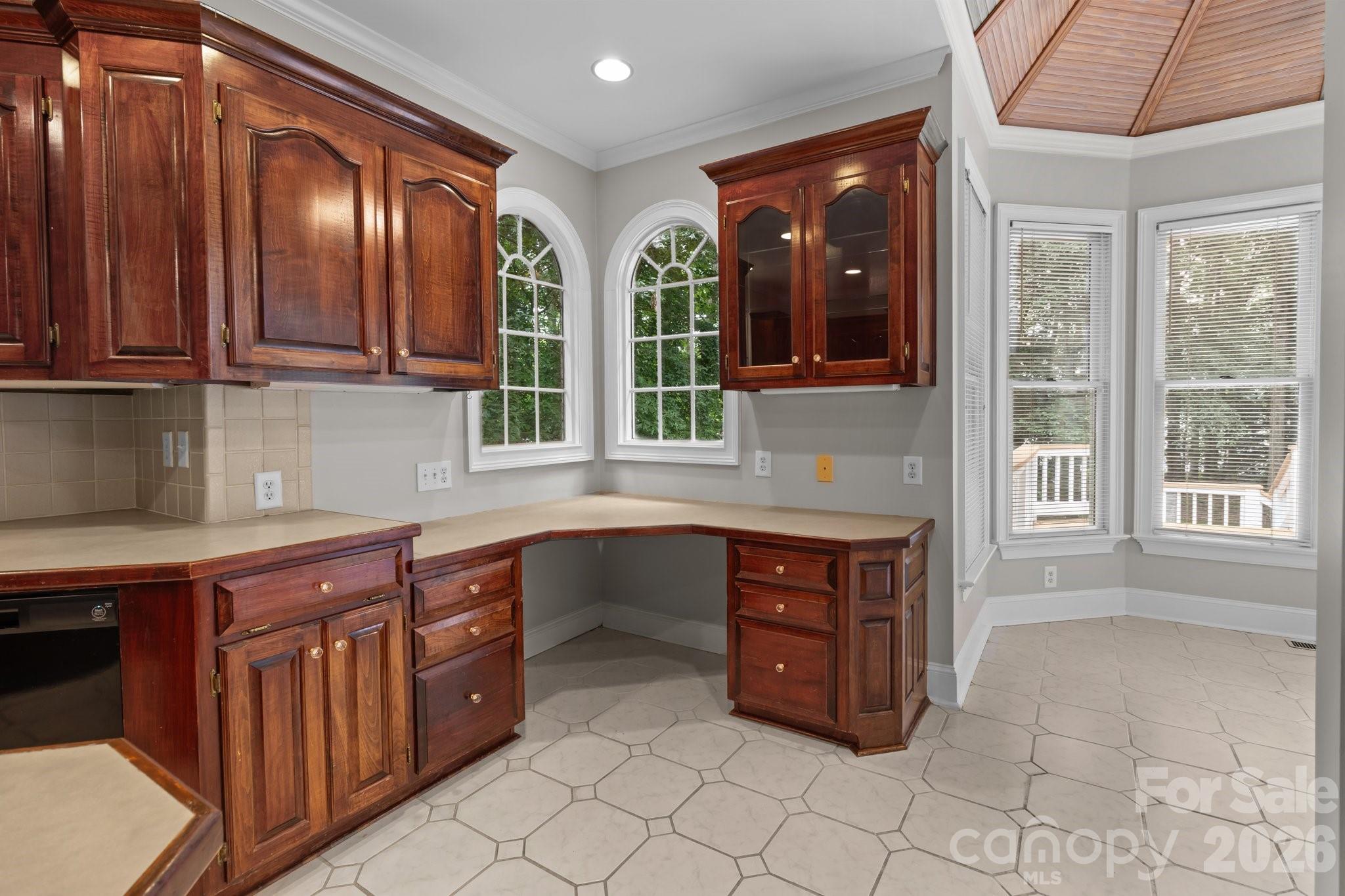 165 Futrell Landing New London, NC 28127 - Photo 13 of 48 a kitchen with stainless steel appliances granite countertop a stove a sink and a granite counter tops