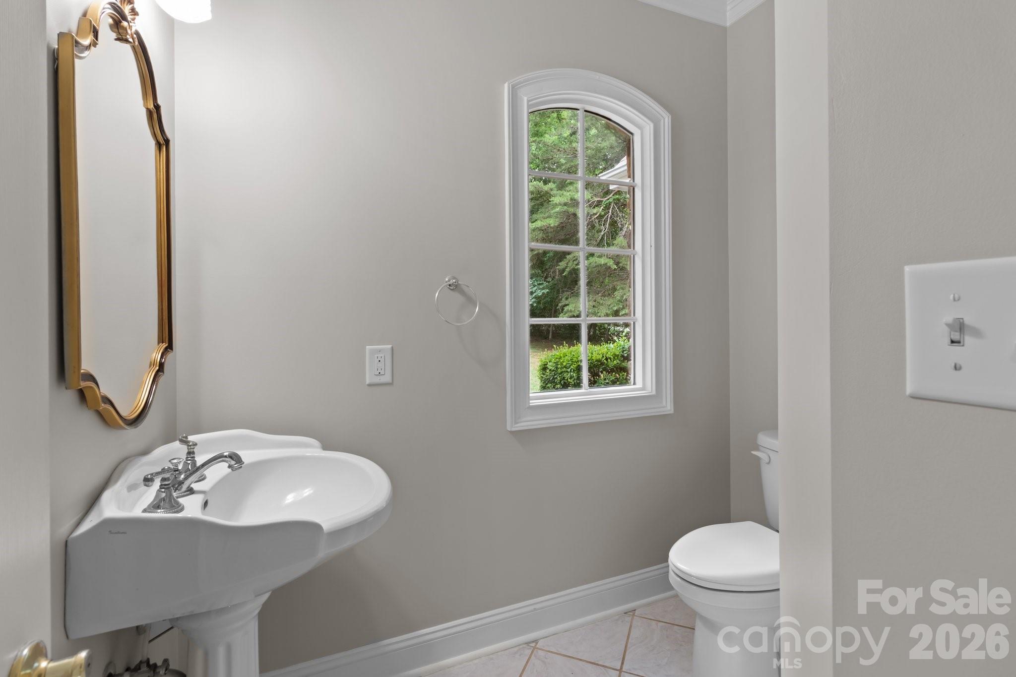 165 Futrell Landing New London, NC 28127 - Photo 20 of 48 a bathroom with a sink toilet and a mirror
