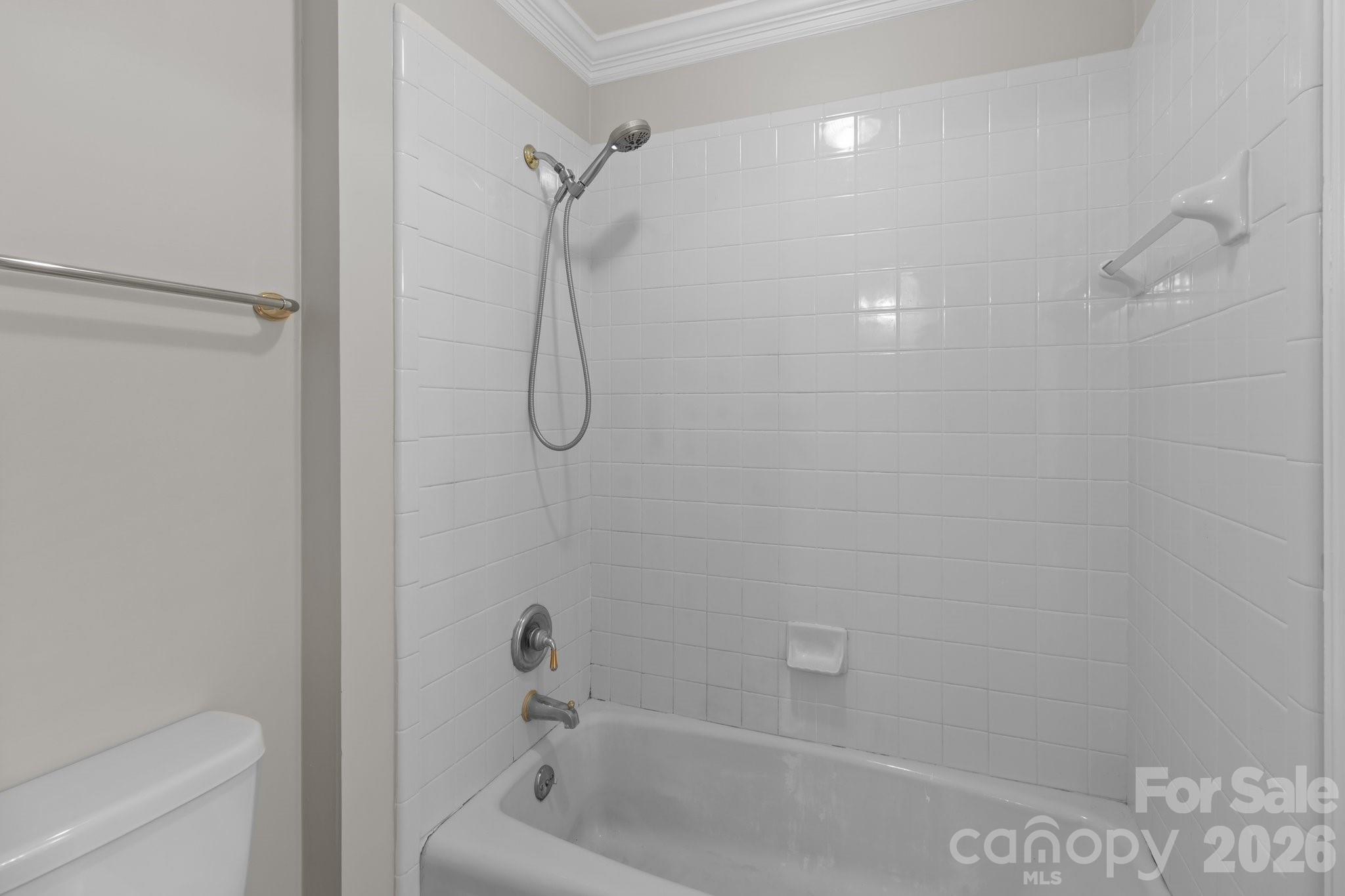 165 Futrell Landing New London, NC 28127 - Photo 33 of 48 a bathroom with a bathtub and a shower