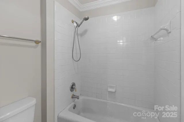 a bathroom with a sink and two mirror