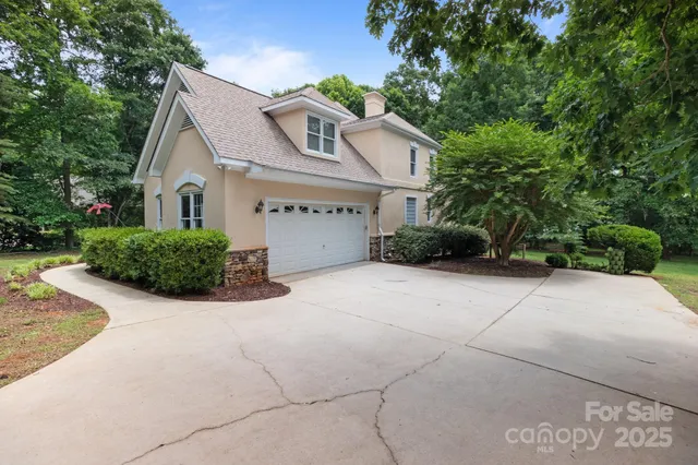 a view of balcony and deck with wooden floor and lake view