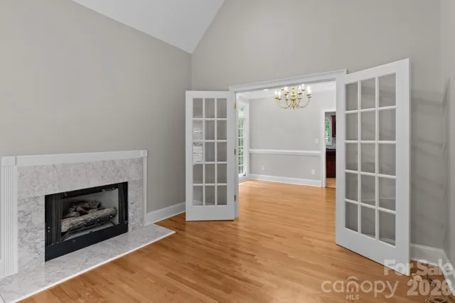 a kitchen with a sink and large window