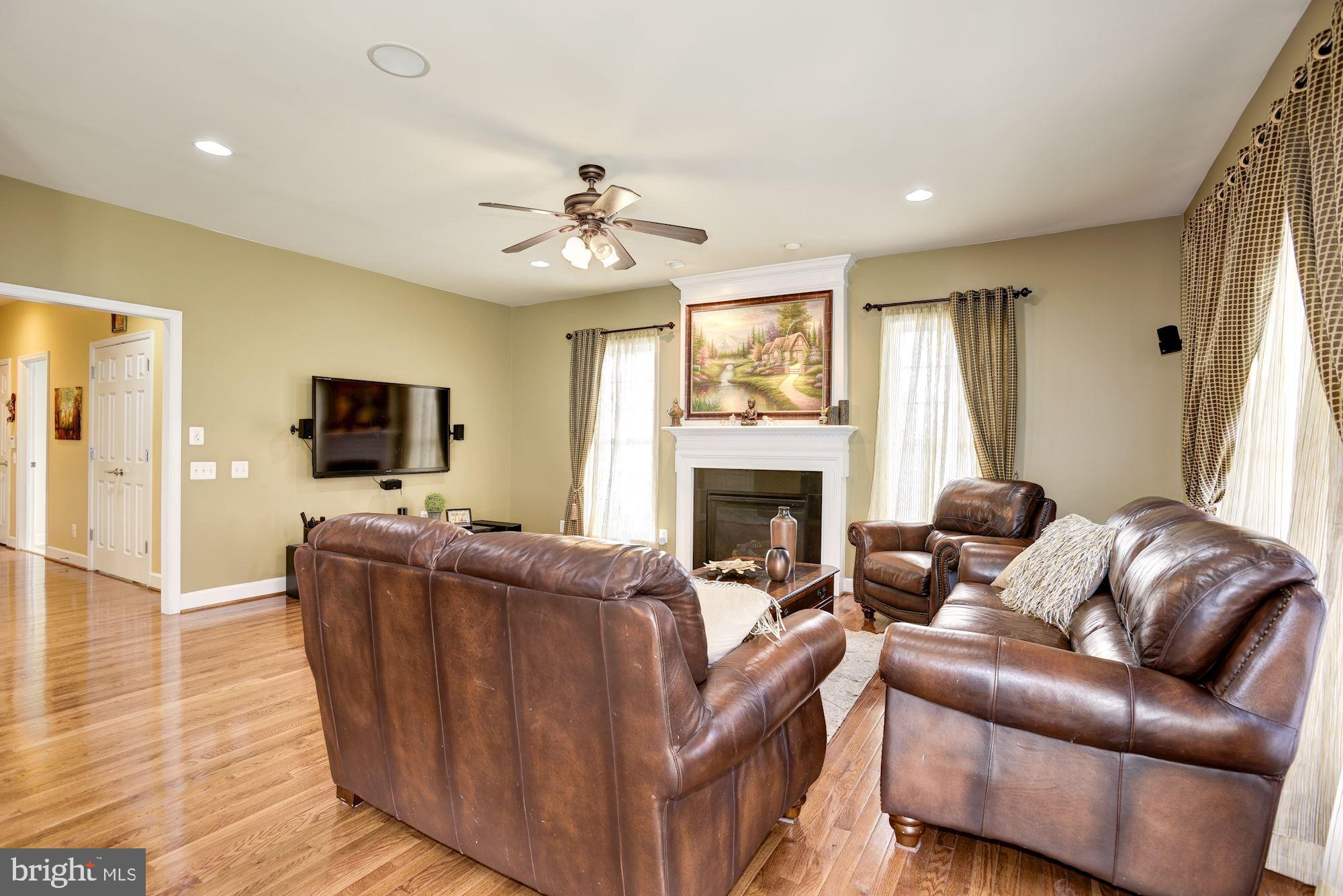 42879 Braemount Circle Ashburn, VA 20148 - Photo 17 of 53 Gas burning fireplace in the family room