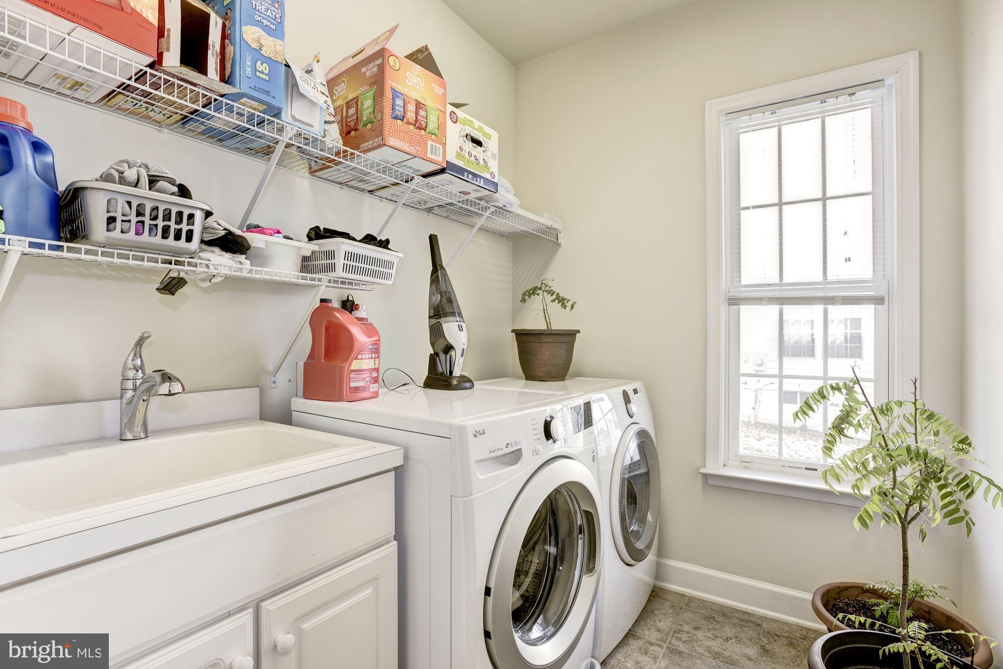 42879 Braemount Circle Ashburn, VA 20148 - Photo 23 of 53 Laundry room on the main level with sink