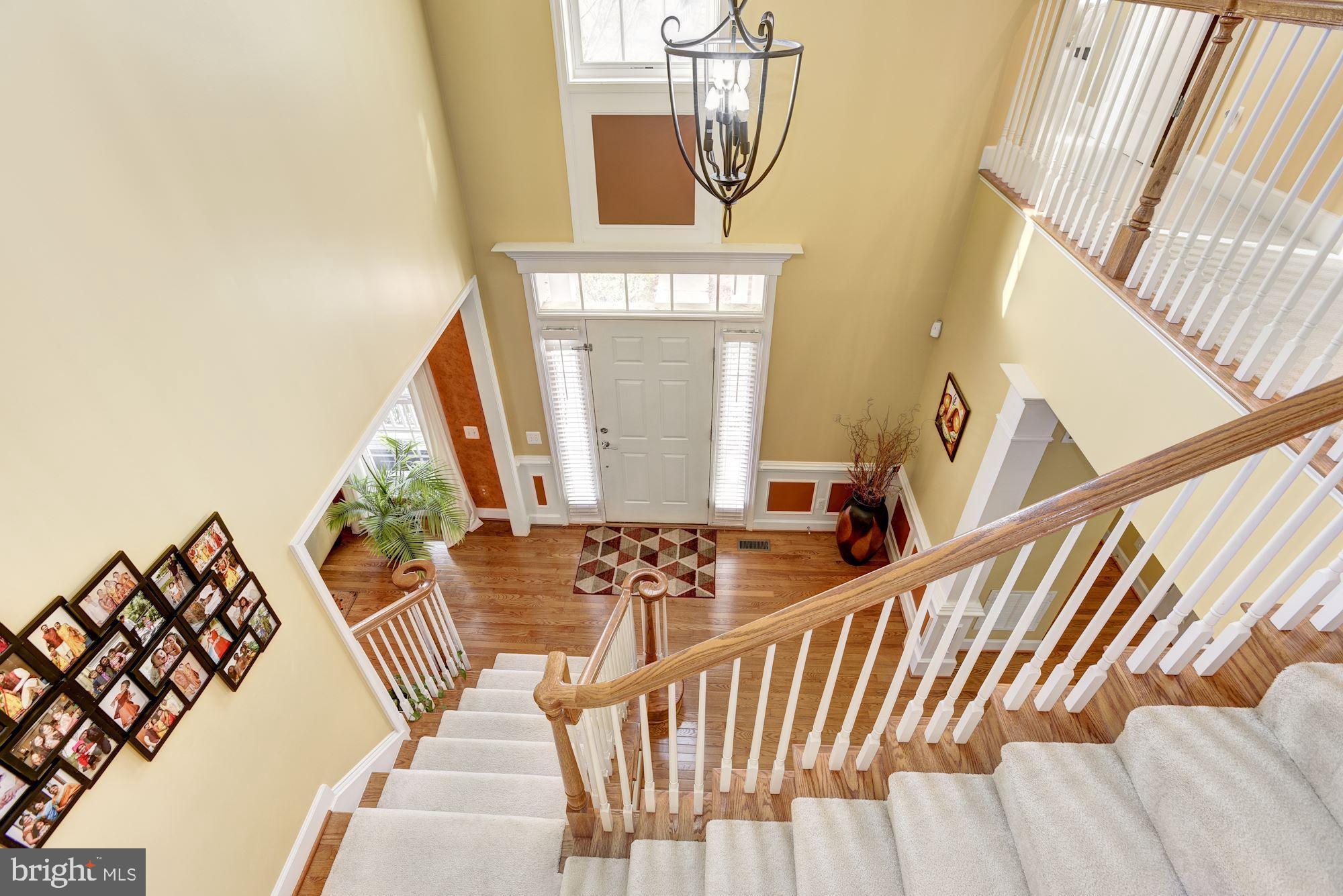 42879 Braemount Circle Ashburn, VA 20148 - Photo 26 of 53 Two-story foyer