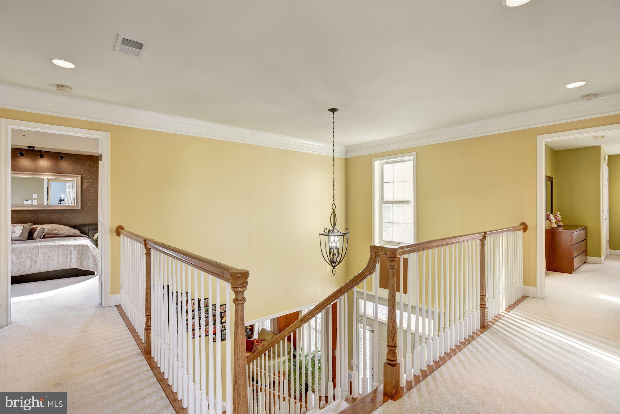42879 Braemount Circle Ashburn, VA 20148 - Photo 27 of 53 Upper landing looking into master bedroom